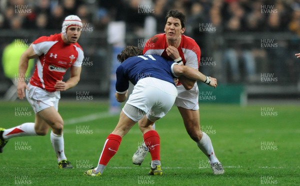 19.03.11 - France v Wales - RBS Six Nations 2011 - James Hook of Wales takes on Alexis Palisson of France. 