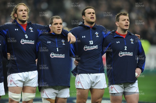 19.03.11 - France v Wales - RBS Six Nations 2011 - Alun Wyn Jones, Paul James, Jamie Roberts and Matthew Rees of Wales line up for the national anthems. 