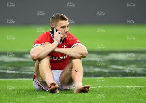 200321 - France v Wales - Guinness Six Nations - A dejected Jonathan Davies of Wales makes a phone call after the game