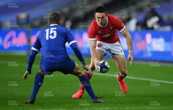241020 - France v Wales - International Rugby Union - Josh Adams of Wales takes on Anthony Bouthier of France