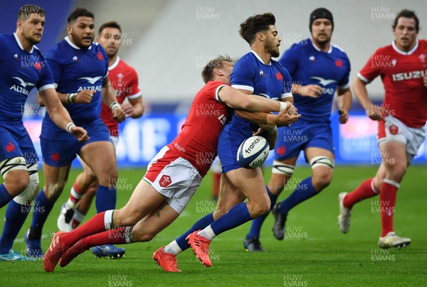 241020 - France v Wales - International Rugby Union - Romain Ntamack of France is tackled by Dan Biggar of Wales