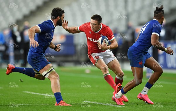 241020 - France v Wales - International Rugby Union - Josh Adams of Wales takes on Charles Ollivon of France