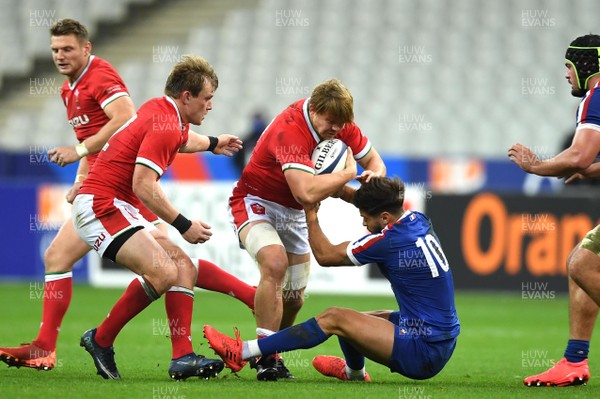 241020 - France v Wales - International Rugby Union - James Davies of Wales bumps off Romain Ntamack of France