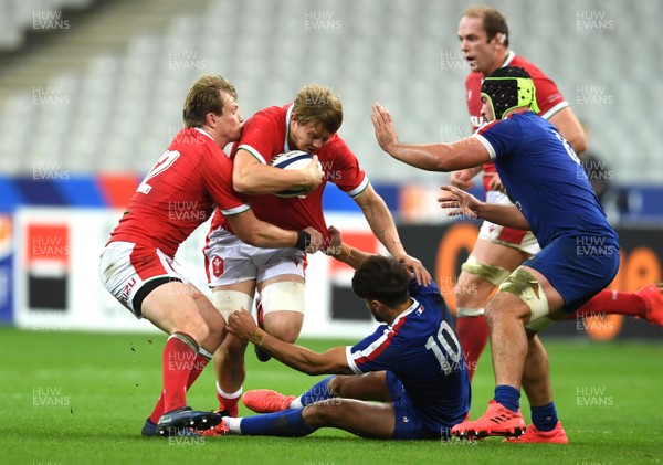 241020 - France v Wales - International Rugby Union - James Davies of Wales bumps off Romain Ntamack of France
