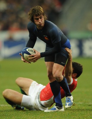 27.02.09 - France v Wales - RBS Six Nations 2009 - France's Maxime Medard is tackled by Jamie Roberts. 