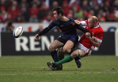 27.02.09 France v Wales... Wales' Martyn Williams tackles France's Morgan Parra. 