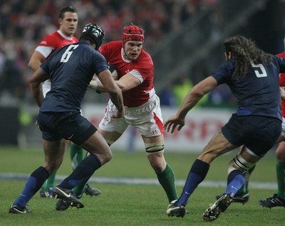27.02.09 France v Wales... Wales' Alun-Wyn Jones tries to get past France's Thierry Dusautoir. 