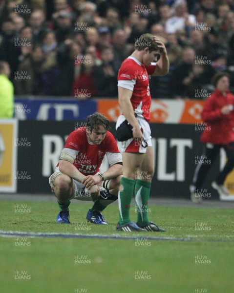 27.02.09 France v Wales... Wales' Ryan Jones(lt) and Leigh Halfpenny dejected at the final whistle. 