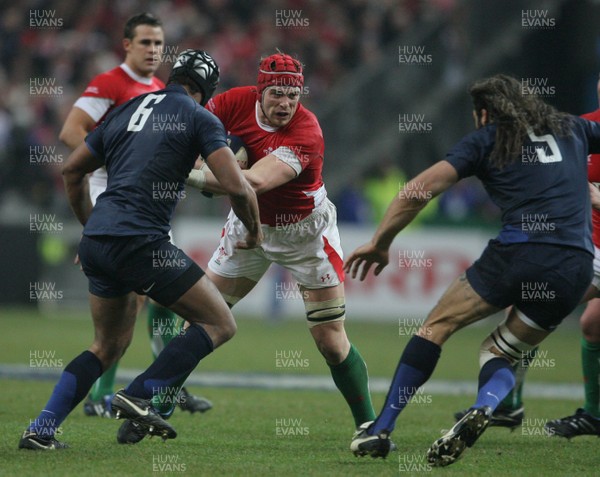 27.02.09 France v Wales... Wales' Alun-Wyn Jones tries to get past France's Thierry Dusautoir. 