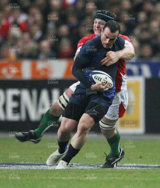 27.02.09 France v Wales... France's Benoit Baby is tackled by Ian Gough. 