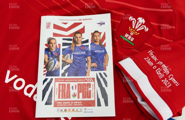230423 - France v Wales, TicTok Women’s 6 Nations - A Wales match shirt and programme  at the Stade des Alpes ahead of the start of the match