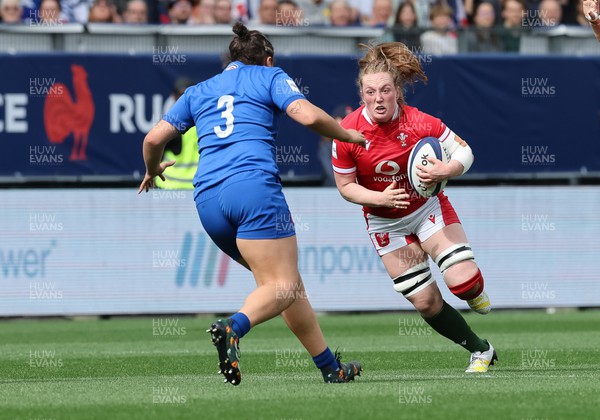 230423 - France v Wales, TicTok Women’s 6 Nations - Abbie Fleming of Wales takes on Assia Khalfaoui of France