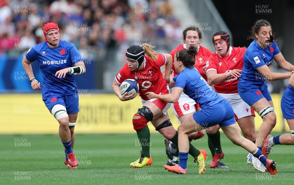 230423 - France v Wales, TicTok Women’s 6 Nations - Bethan Lewis of Wales takes on Gabrielle Vernier of France