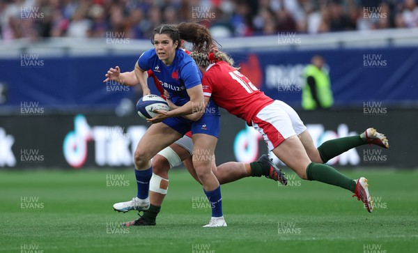 230423 - France v Wales, TicTok Women’s 6 Nations - Cyrielle Banet of France is tackled by Hannah Jones of Wales