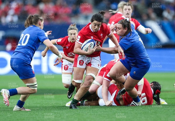 230423 - France v Wales, TicTok Women’s 6 Nations - Sioned Harries of Wales splits the French defence