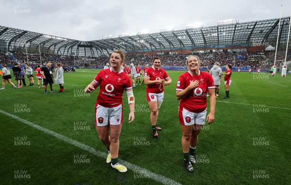 230423 - France v Wales, TicTok Women’s 6 Nations - Kate Williams of Wales, Gwenllian Pyrs of Wales and Kelsey Jones of Wales applaud their family, friends and supporters at the end of the match