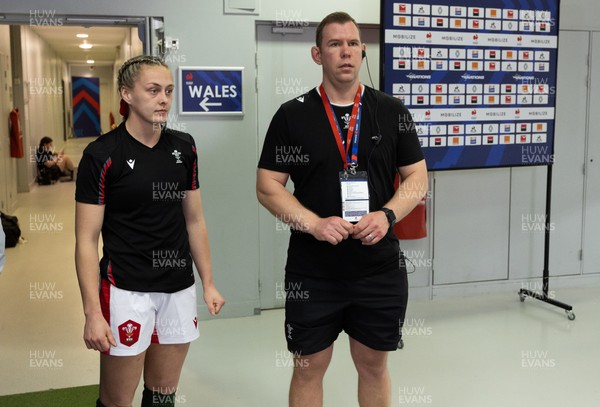 230423 - France v Wales, TicTok Women’s 6 Nations - Hannah Jones of Wales and Wales head coach Ioan Cunningham wait for the coin toss
