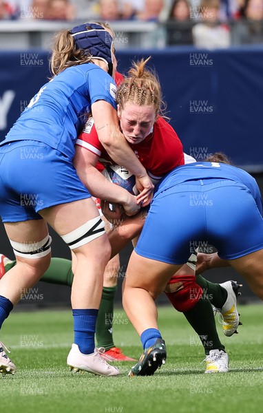 230423 - France v Wales, TicTok Women’s 6 Nations - Abbie Fleming of Wales is tackled 