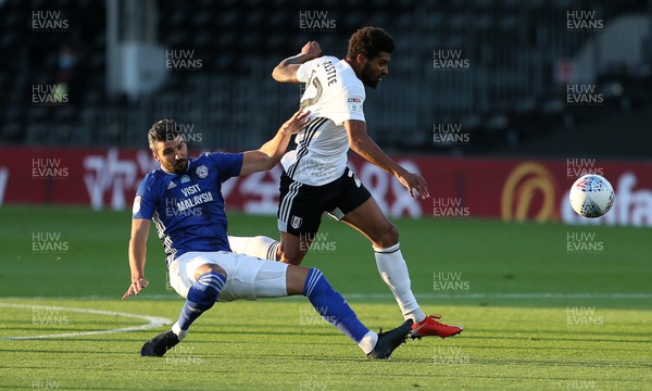 100720 - Fulham v Cardiff City - SkyBet Championship - Cyrus Christie of Fulham is tackled by Callum Paterson of Cardiff City
