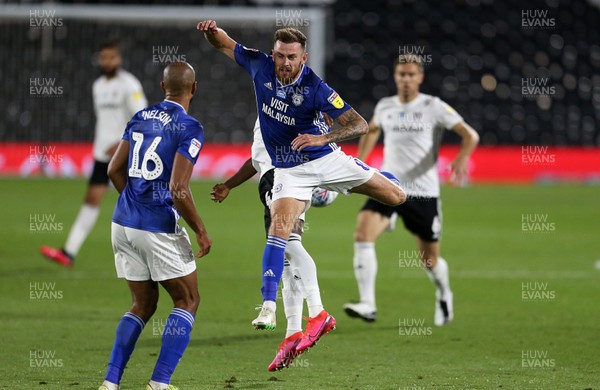 100720 - Fulham v Cardiff City - SkyBet Championship - Joe Ralls of Cardiff City is challenged by Steven Sessegnon of Fulham