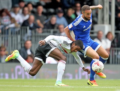 200816 - Fulham vs Cardiff City - SkyBet Championship -Ryan Sessegnon of Fulham battles with Cardiff's Jazz Richards