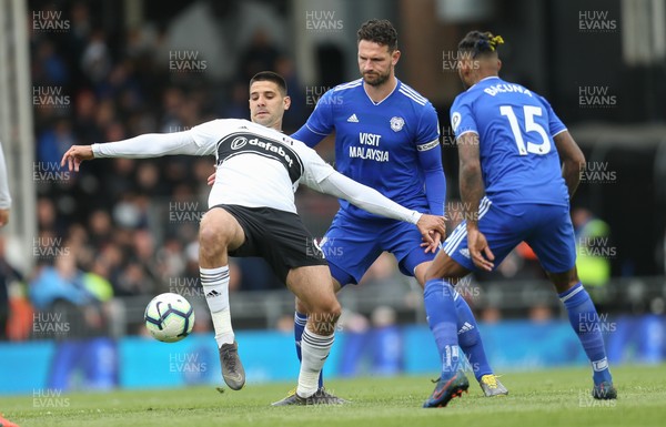 270419 - Fulham v Cardiff City, Premier League - Aleksandar Mitrovic of Fulham is challenged by Sean Morrison of Cardiff City