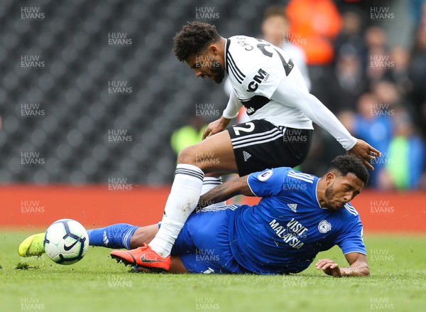 270419 - Fulham v Cardiff City, Premier League - Nathaniel Mendez-Laing of Cardiff City and Cyrus Christie of Fulham compete for the ball