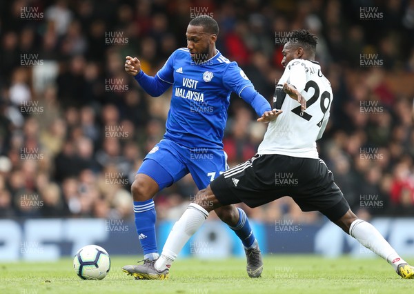 270419 - Fulham v Cardiff City, Premier League - Junior Hoilett of Cardiff City is tackled by Andre-Frank Zambo Anguissa of Fulham