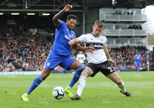270419 - Fulham v Cardiff City, Premier League - Nathaniel Mendez-Laing of Cardiff City and Joe Bryan of Fulham compete for the ball