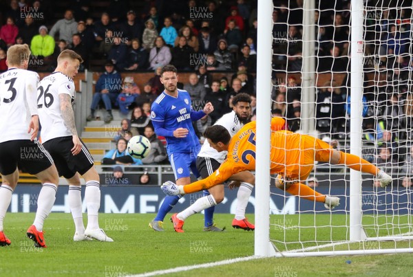 270419 - Fulham v Cardiff City, Premier League - Sean Morrison of Cardiff City sees Fulham goalkeeper Sergio Rico save his headed attempt at goal