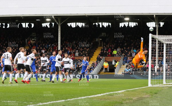 270419 - Fulham v Cardiff City, Premier League - Fulham goalkeeper Sergio Rico tips a shot at goal over the crossbar