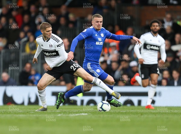 270419 - Fulham v Cardiff City, Premier League - Danny Ward of Cardiff City takes on Maxime Le Marchand of Fulham