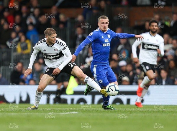 270419 - Fulham v Cardiff City, Premier League - Danny Ward of Cardiff City takes on Maxime Le Marchand of Fulham