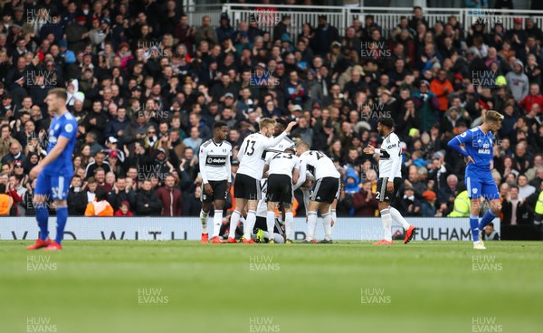 270419 - Fulham v Cardiff City, Premier League - Fulham players celebrate after scoring goal