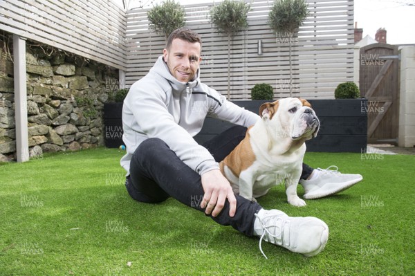 050418 - Interview Sam Peters - Wales and Scarlets rugby player Gareth Davies at his home in Cardiff with his dog "Pete"