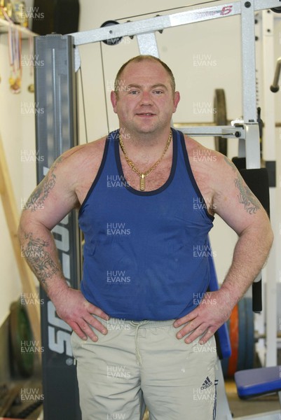 040106Insurance case study Powerlifter Garry Bamsey in the gym at his home in Port Talbot  