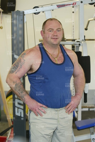 040106Insurance case study Powerlifter Garry Bamsey in the gym at his home in Port Talbot  