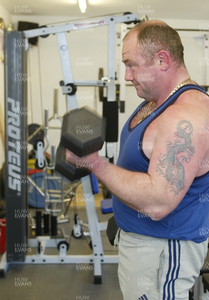 040106Insurance case study Powerlifter Garry Bamsey in the gym at his home in Port Talbot  