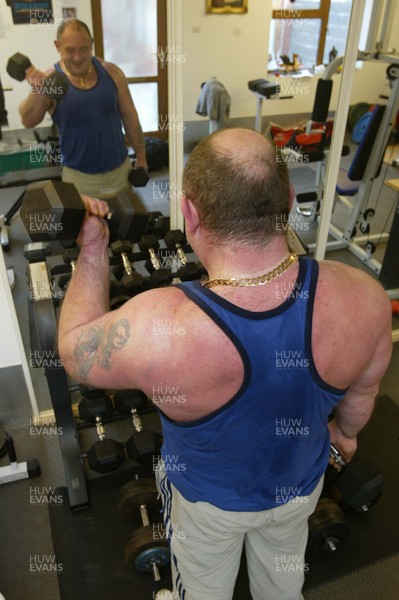 040106Insurance case study Powerlifter Garry Bamsey in the gym at his home in Port Talbot  