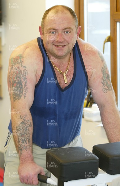 040106Insurance case study Powerlifter Garry Bamsey in the gym at his home in Port Talbot  