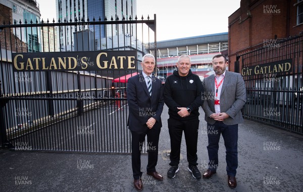 291119 - Former Wales Head Coach Warren Gatland with WRU Chairman Gareth Davies, left, and WRU Chief Executive Martyn Phillips at the newly named Gatland's Gate at the Principality Stadium