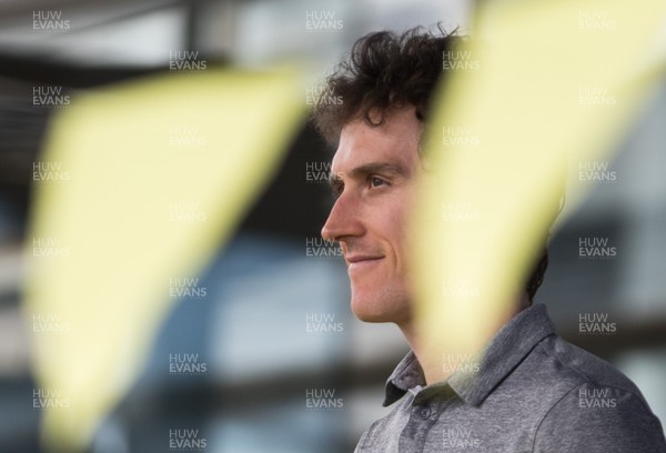 090818 - Geraint Thomas Homecoming Event, Senedd, Cardiff Bay - Welsh Tour de France winner Geraint Thomas looks out on the crowd as he is welcomed onto the steps of the Senedd in Cardiff Bay as the nation celebrates his victory in the 2018 Tour de France