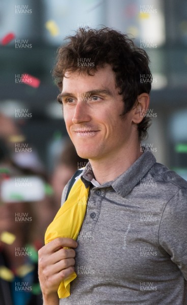 090818 - Geraint Thomas Homecoming Event, Senedd, Cardiff Bay - Welsh Tour de France winner Geraint Thomas looks out on the crowd as he is welcomed onto the steps of the Senedd in Cardiff Bay as the nation celebrates his victory in the 2018 Tour de France