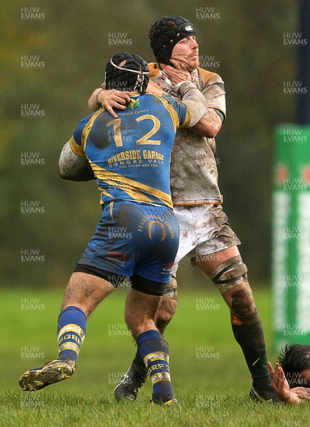 021113  - Gilfach Goch v Merthyr - SWALEC League 1 - Nathan Walters is tackled by Craig Lynch