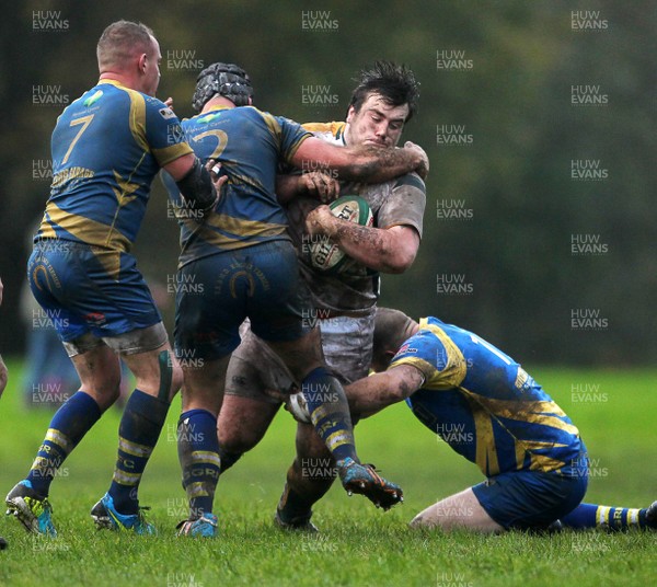 021113  - Gilfach Goch v Merthyr - SWALEC League 1 - Dan Preece is tackled by Andrew Williams and Christopher Martenko