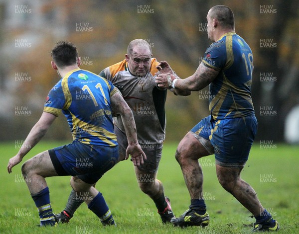 021113  - Gilfach Goch v Merthyr - SWALEC League 1 - Gareth Way runs into Ross James and Christopher Martenko