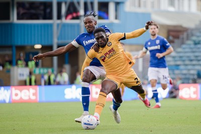 031026 - Gillingham v Newport County - Sky Bet League 2 - Omar Beckles of Gillingham and Michael Adu-Poku of Newport County in action