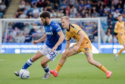 031026 - Gillingham v Newport County - Sky Bet League 2 - Nick Freeman of Gillingham and Matthew James Jacob of Newport County in action