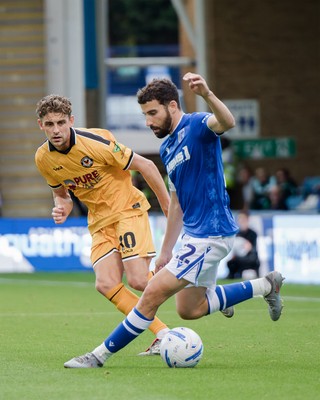 031026 - Gillingham v Newport County - Sky Bet League 2 - Nick Freeman of Gillingham and Harrison Biggins of Newport County in action
