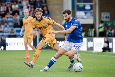 031026 - Gillingham v Newport County - Sky Bet League 2 - Nick Freeman of Gillingham and Harrison Biggins of Newport County in action